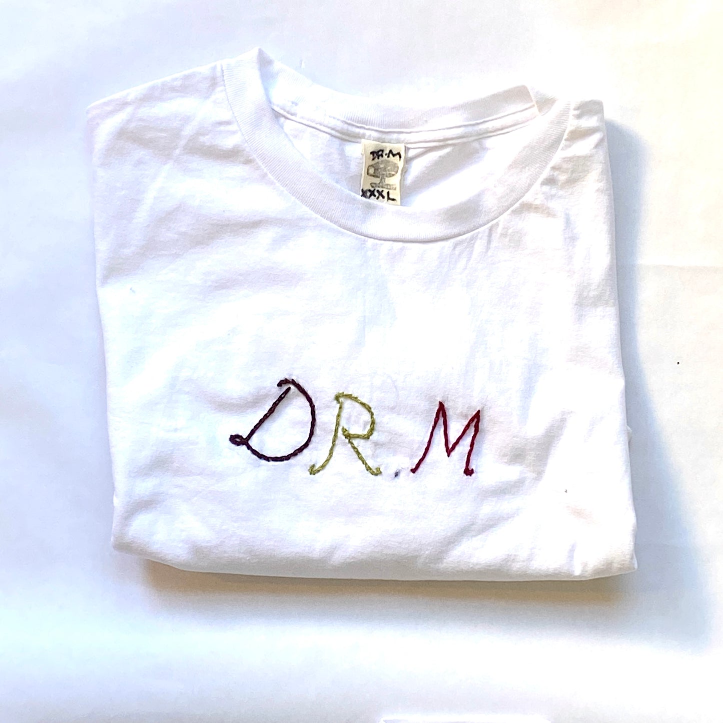 Dr.M’s embroidered T-shirts
