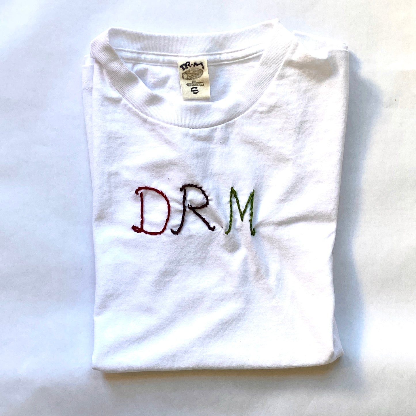 Dr.M’s embroidered T-shirts